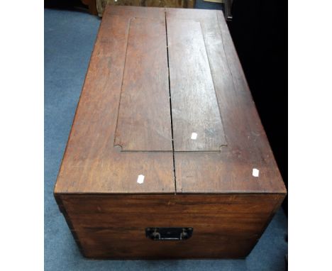 A 19TH CENTURY COLONIAL HARDWOOD TRUNK with raised panel to the lid, 103cm wide 