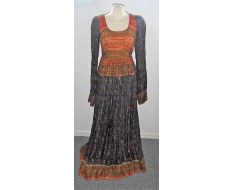 A 1970'S FULL LENGTH BOHO STYLE DAY DRESS fashioned by Ayesha, the bodice falling away into full length A-line skirt in print