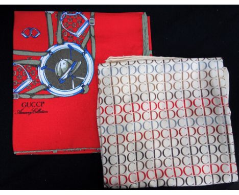 GUCCI: A red silk scarf from the Gucci Accessory collection, screen printed with polo helmet, reins and equestrian detail, si
