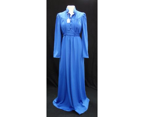 OSSIE CLARKE FOR RADLEY: a royal blue synthetic crepe de chine, full length dress with button through detail to bodice 