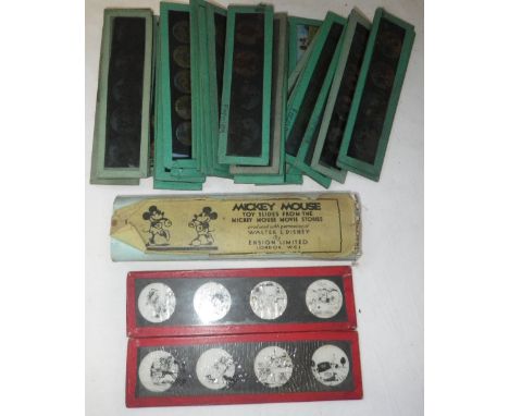 "MICKEY MOUSE" A PAIR OF EARLY GLASS TOY SLIDES, produced with permission of "Walter E Disney" by Ensign Limited and a collec