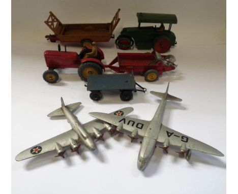 DINKY TOYS; AN EMPIRE FLYING BOAT, a long range bomber, a Massey -Harris tractor with trailer and similar items