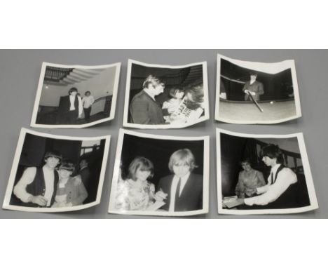 Six black and white 9x9cm candid fan photographs of the Rolling Stones, backstage at Queens Hall Leeds, early/mid 1960s, incl