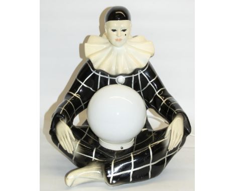 Late C20th composition figural table lamp base modelled as a seated Pierrot clown, with globe shade, H41cm 