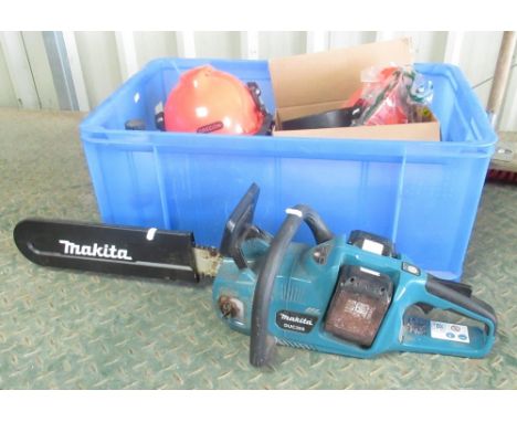 Makita battery chainsaw, gloves, two helmets, etc 