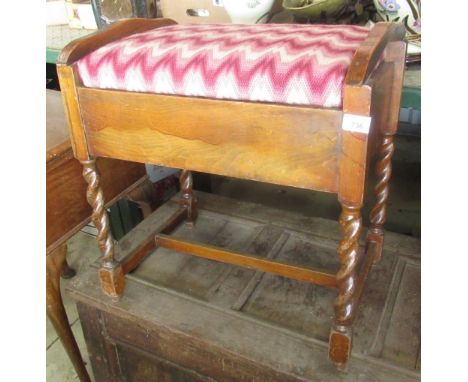 Oak piano stool with lift up seat containing books on piano and music, two serenade harmonicas and a recorder 