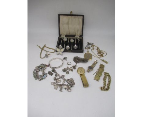 Silver charm bracelet with approx. 17 silver and white metal charms, most stamped Sterling, 800, 835, Silver or hallmarked, a