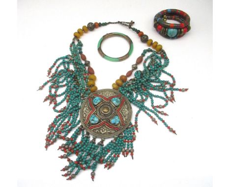 Tibetan white metal necklace set with turquoise and coloured beads, a similar bracelet and a jade bangle with silver gilt det