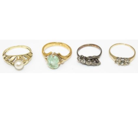 Yellow metal ring set with pale green stone, hallmarks worn, size L1/2, a yellow metal ring set with single pearl, stamp worn