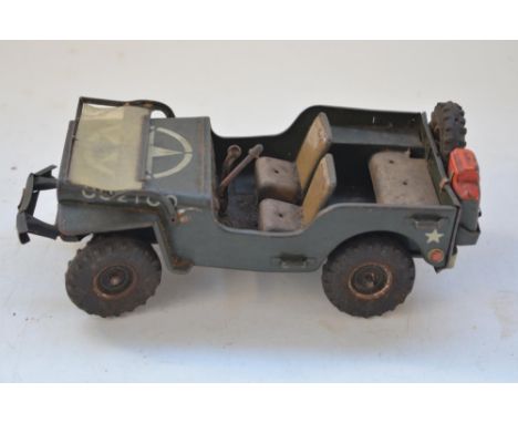 Vintage Arnold tinplate US Army Jeep model, friction power mechanism not working, missing steering wheel but steering does wo