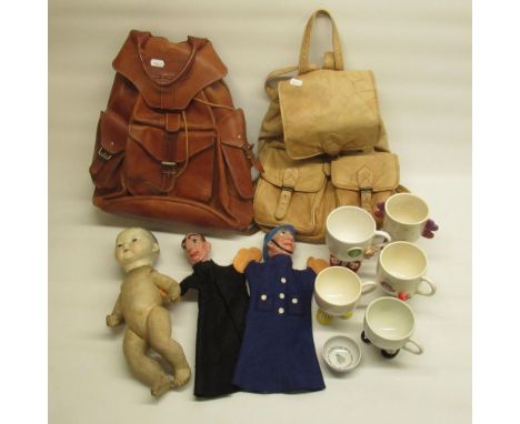 A policeman and a priest hand puppets' and a bisque headed oriental doll made in Germany, collection of Carlton Ware mugs wit