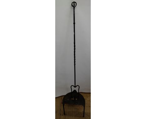 C19th cast and wrought iron D shaped footman, with pad front foot, W33cm D25cm H32cm, and a wrought metal toasting fork, with