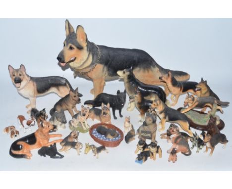Collection of ceramic Alsatian ornaments and figures from various manufacturers including Robert Harrop, Country Artists, Tev