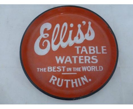 An Ellis's Table Waters of Ruthin circular enamel tray, 10" diameter.