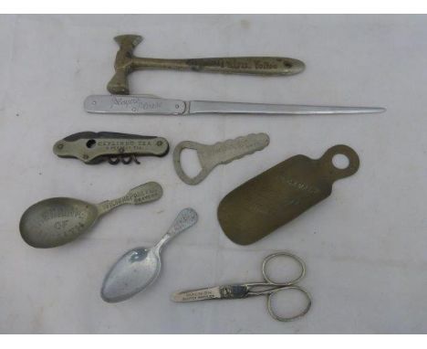 A selection of unusual advertising household items including a Palm Toffee hammer, a Macnish Scotch Whiskies pair of scissors