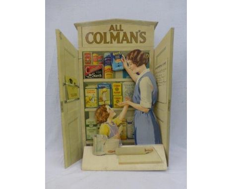 A rare and large Colman's triptych 3D show card depicting a mother and child standing at a larder of food, approx. 26 1/2 x 3