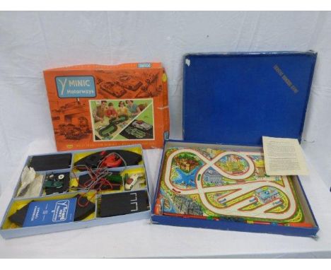 A boxed Mini Motorways scale model set by Triang and a boxed German tinplate 'Traffic Control Game'.