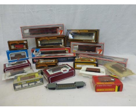 A box of assorted rolling stock and carriages by Airfix, Wrenn, Lima, Mainline, Hornby, etc.