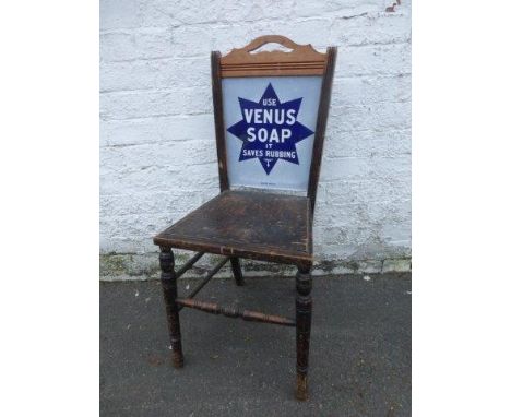 A department store chair with double sided enamel back advertising Venos Soap by Falkirk Iron Co. with one spot retouched on 