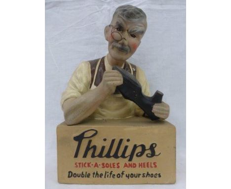 A Phillips Stick-a-Soles and Heels composite shop window display advertising figure.