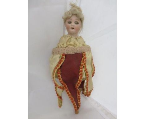 An unusual Schoenau Hoffmeister bisque headed puppet doll.