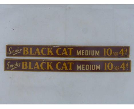 A pair of Black Cat 'Medium' shelf strips.