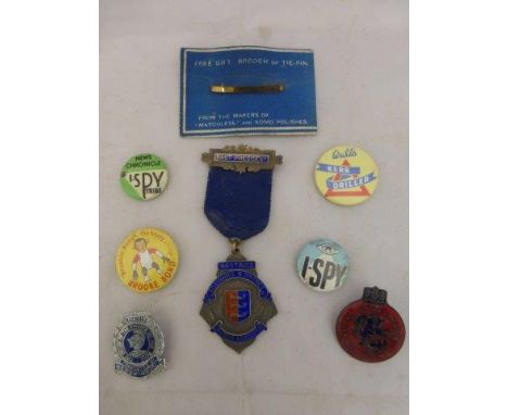 A selection of enamel and other badges to include a silver St. Leonards and District Grocers Association of Hastings Past Pre