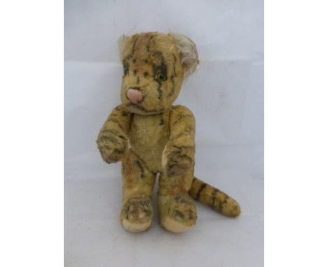 A Chad Valley teddy bear in the form of a tiger.