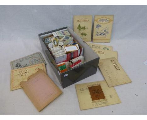 A box of part sets of cigarette collector's cards including railway locomotives, Chivalry of Valour, Interesting Customs and 
