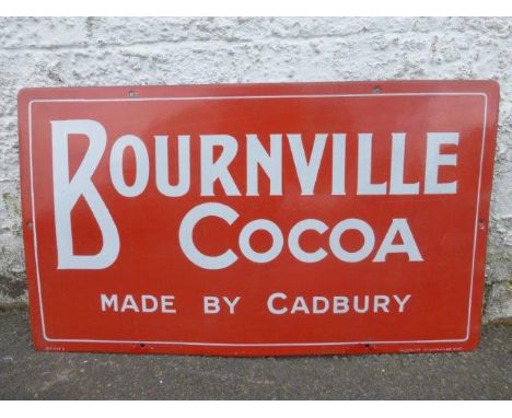 A Bournville Cocoa 'Made by Cadbury' red rectangular enamel sign, 24 x 14".