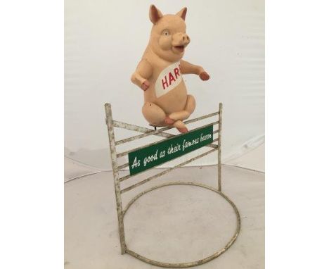 Yesterday's World Museum Butchers - a Harris Bacon counter top advertising figure/ham stand in the form of a seated pig astri