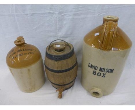 A stoneware flagon and a ceramic cider barrel.