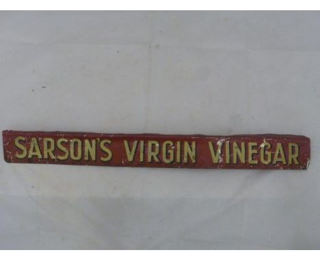 A Sarson's Virgin Vinegar shelf strip.