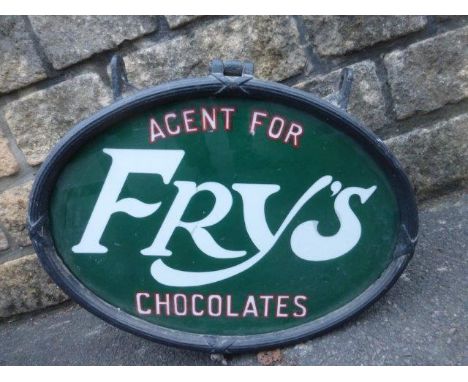 A rare Fry's Chocolates oval lightbox of copper and steel construction with hinged front panel, rear panel missing, 19 1/2 x 