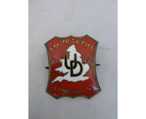 A United Dairies (London) Limited shaped enamel badge. 