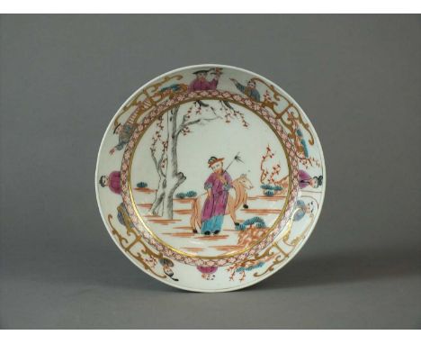 A rare Worcester saucer circa 1768-72 finely executed with a Qianlong-style 'Mandarin' pattern and hexagonal cell border, cen