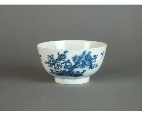 A Caughley slop or waste bowl circa 1780 transfer-printed in underglaze blue with the Birds in Branches pattern, underglaze b