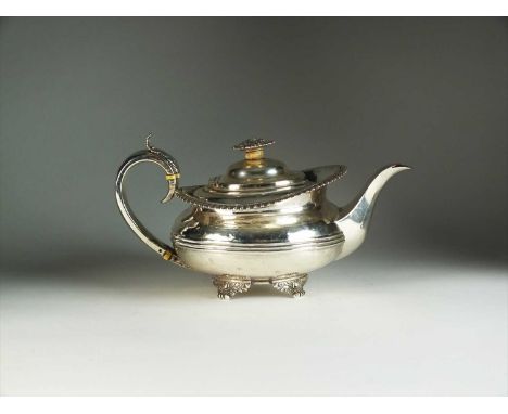 A George IV silver teapot, George Burrows II, London 1825, of compressed circular form with reeded band to the waist, gadroon