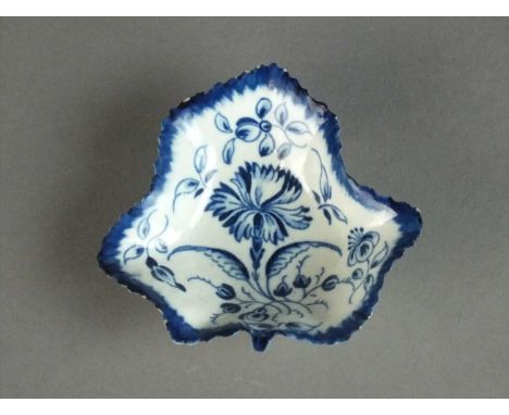A Worcester pickle leaf dish circa 1765-70 painted with a central gillyflower and unusually bountifully flanked by further su