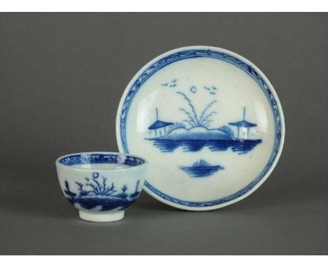 A Caughley toy tea bowl and saucer circa 1780-90 painted in blue with the Island pattern between an associated border, unmark