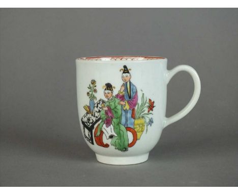 A Worcester coffee cup circa 1770 of plain form with indented loop handle, decorated in polychrome with a Chinese family grou