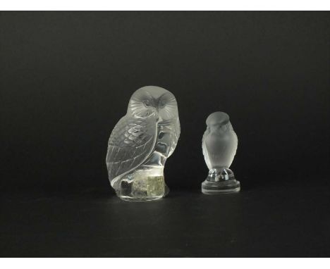 A Lalique Crystal model of an owl together with further Lalique Crystal model of a Falcon post-war, engraved signature and pa