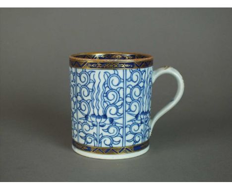 A Caughley mug in the 'Royal Lily' pattern circa 1786-94 of plain cylindrical form, having double indented strap handle with 
