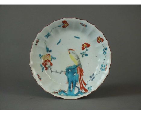 A Worcester saucer dish in the 'Sir Joshua Reynolds' pattern circa 1768-70 of part-fluted form with a moulded exterior border