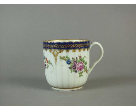 A Worcester coffee cup circa 1780 of reeded form, painted in polychrome enamels with the 'Royal Marriage' pattern with three 