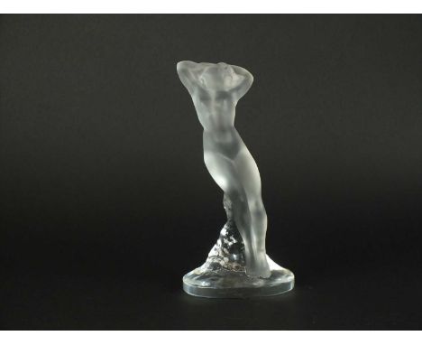 A Lalique Crystal model of a nude female post-war frosted glass, modelled standing with hands outstretched behind her head, n