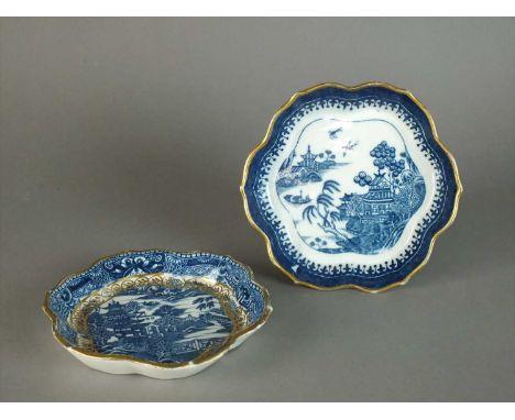 Two Caughley teapot stands circa 1782-92 of hexagonal form, transfer-printed in underglaze blue with the 'Pagoda' and 'Willow
