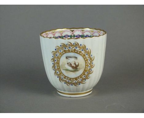 A Caughley coffee cup circa 1790 of fluted form, painted and decorated in gilt by Chamberlains, Worcester with a central moti