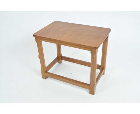 A Robert 'Mouseman' Thompson occasional table,with adzed tablet top over chamfered octagonal supports bearing the carved mous