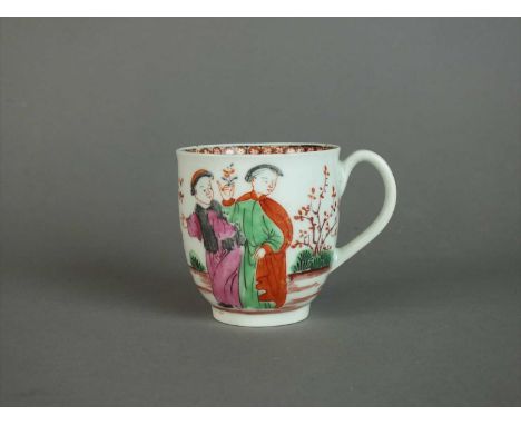 A Worcester coffee cup circa 1762 of plain shape with indented loop handle, painted with a continuous scene of Chinese figure